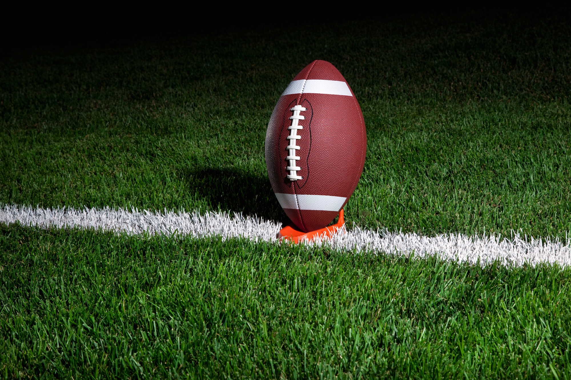 College Football on a Tee at Night