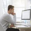 College student using computer at home